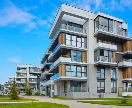 Modern apartment flats in a UK residential development, showcasing contemporary urban living and housing design.